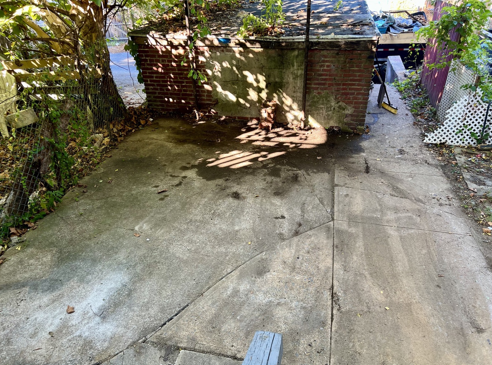 A backyard junk removal by TipTop, after